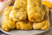 Cheesy Ham Sticks: Quick Baked Snack Recipe