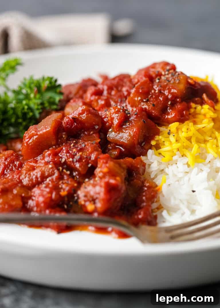 side view: plated serving of Persian eggplant stew
