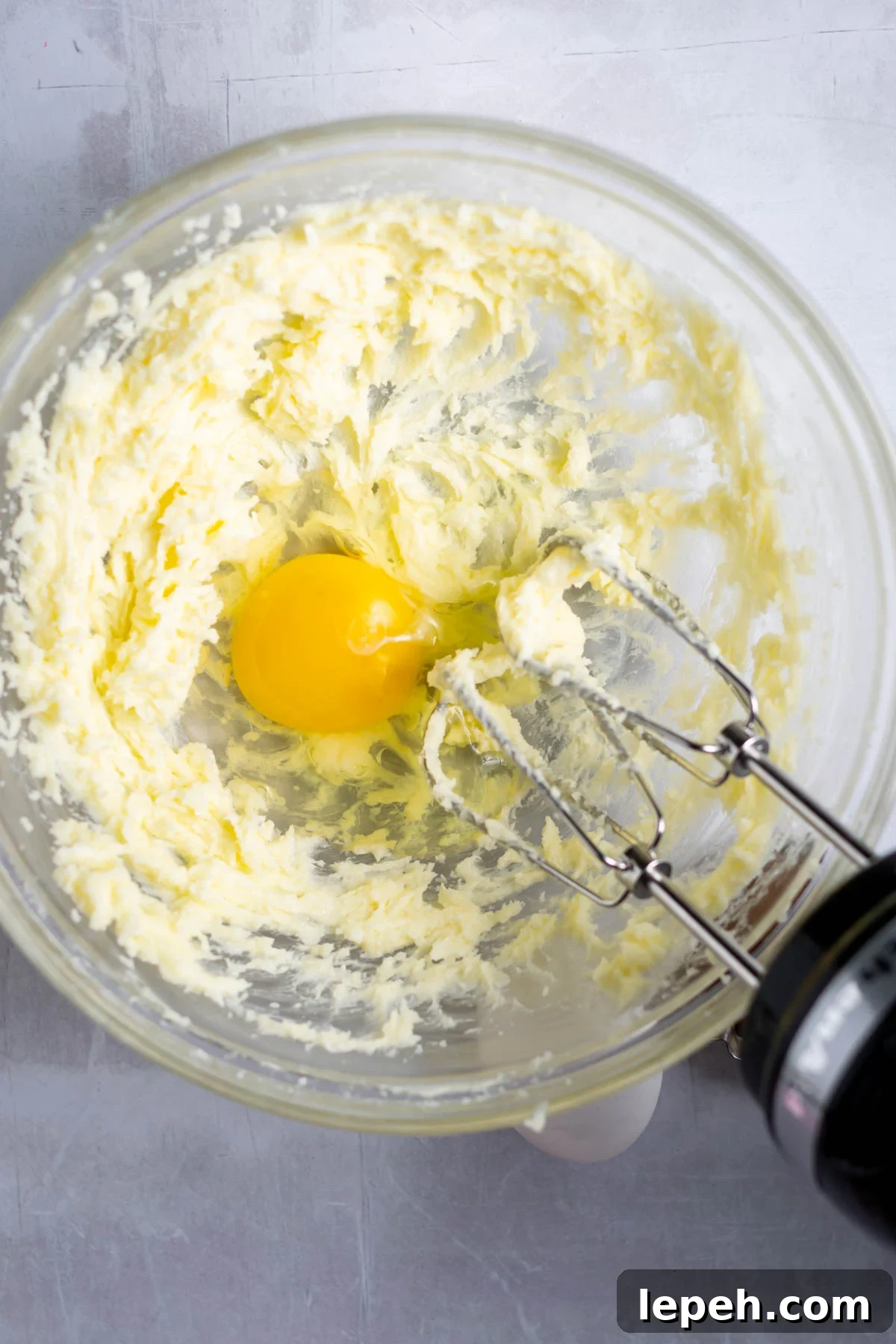 egg added to creamed butter and sugar