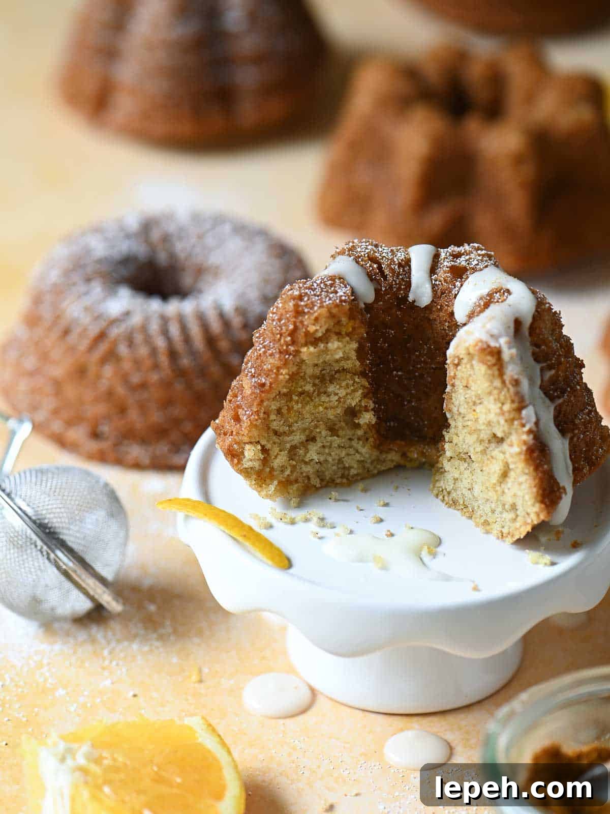 A bundt cake sliced open showing the texture of the cake.