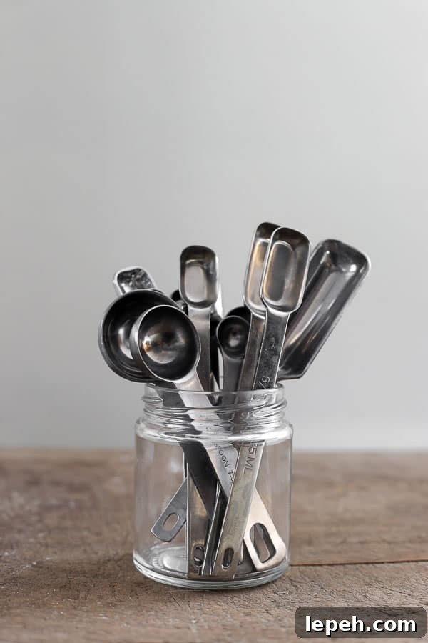 measuring spoons in a glass jar