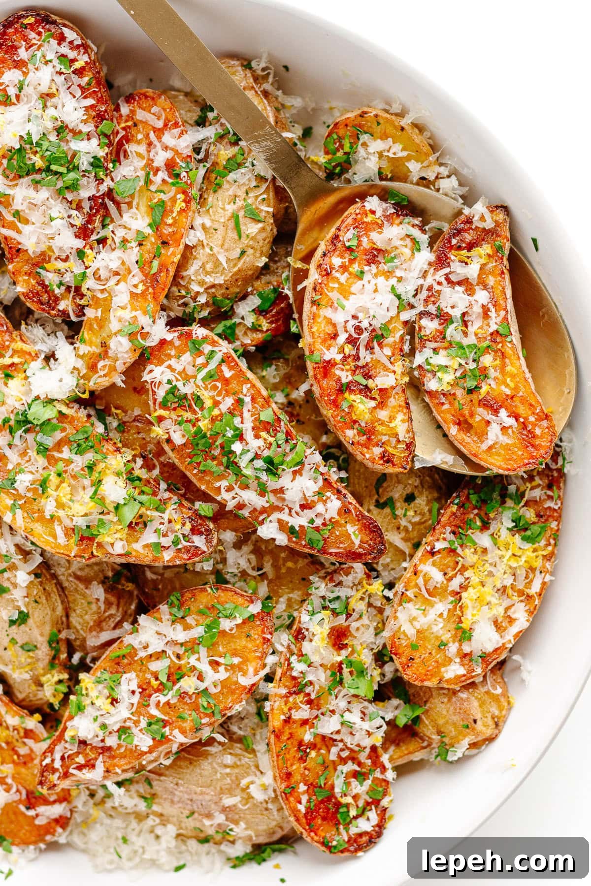 Parmesan truffle roasted fingerling potatoes in serving bowl.