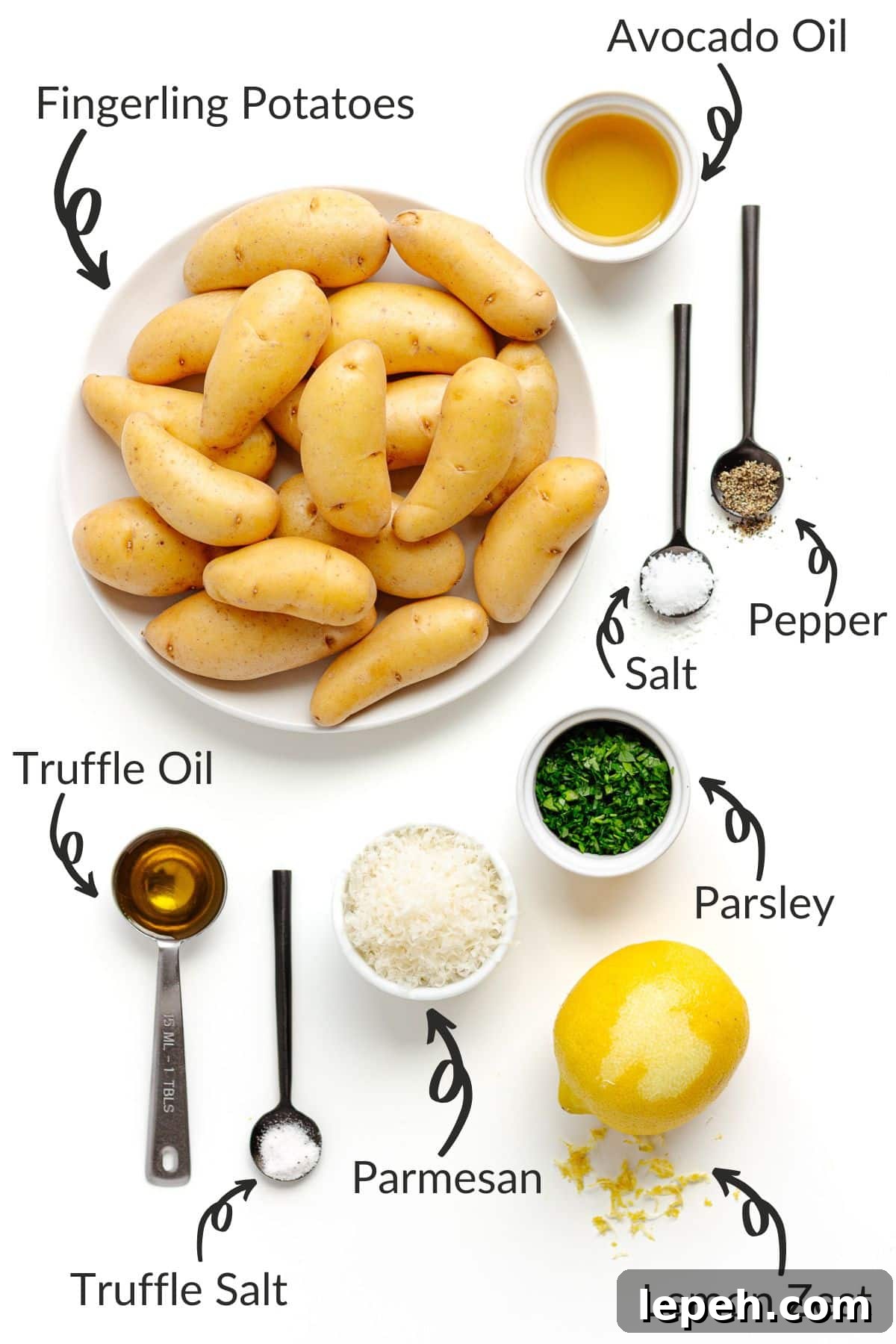 Labelled photo of ingredients for parmesan truffle roasted fingerling potatoes.