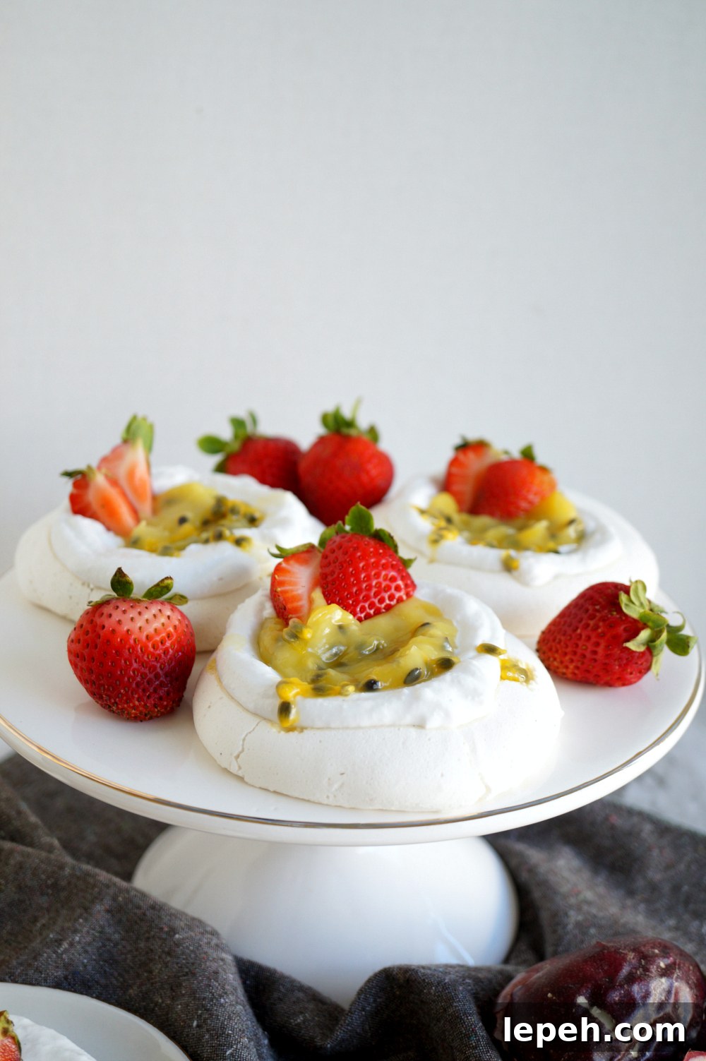 mini vegan pavlovas with coconut cream and passionfruit curd | The Baking Fairy #FreakyFruitsFriday