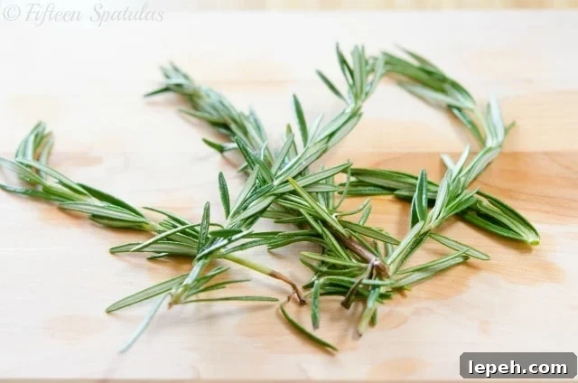 Rosemary Sprigs on Cutting Board