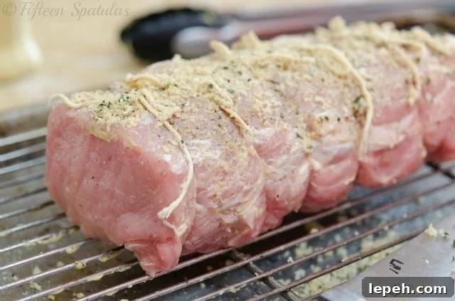 using kitchen twine to tie a pork loin