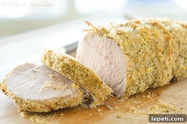Rosemary Bread Crumbs as Pork Loin Coating on Cutting Board 