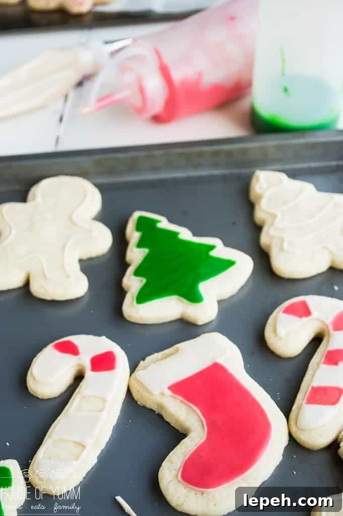 The PERFECT soft sugar cookie. Plus How to Ice your cookies the EASY way! You definitely need to know this method anyone can do it!!