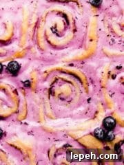 blueberry cinnamon rolls with blueberry cream cheese glaze