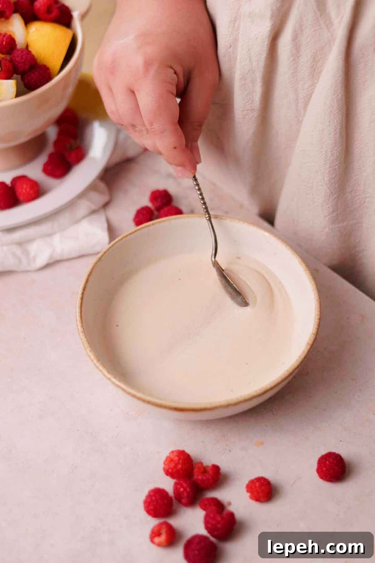 bloomed yeast with thick foam on top in a bowl