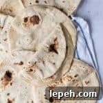 Easy flatbreads on a tea towel.
