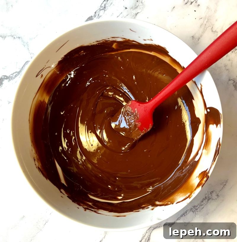 Melted chocolate chips in a microwave safe bowl.