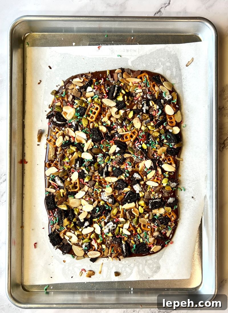 Cowboy Chocolate Christmas Bark unbroken on a sheet pan.