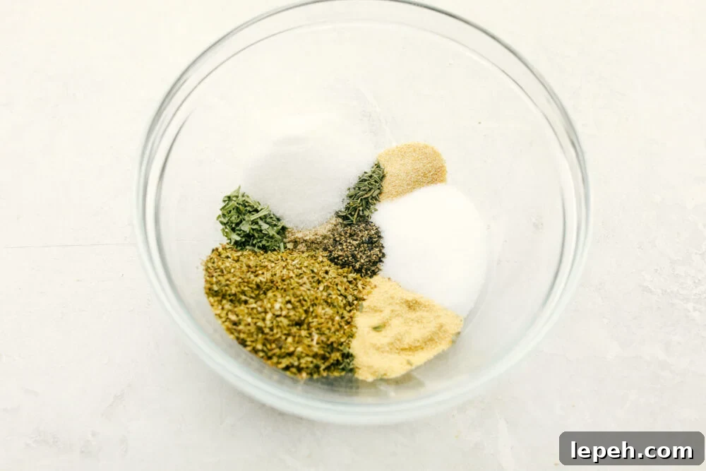 Seasonings separated in a glass bowl.