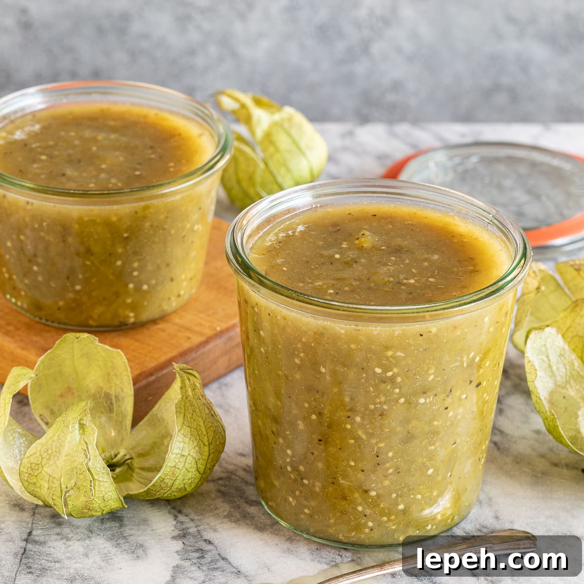 Jars are freshly made tomatillo sauce ready for the ridge or freezer.