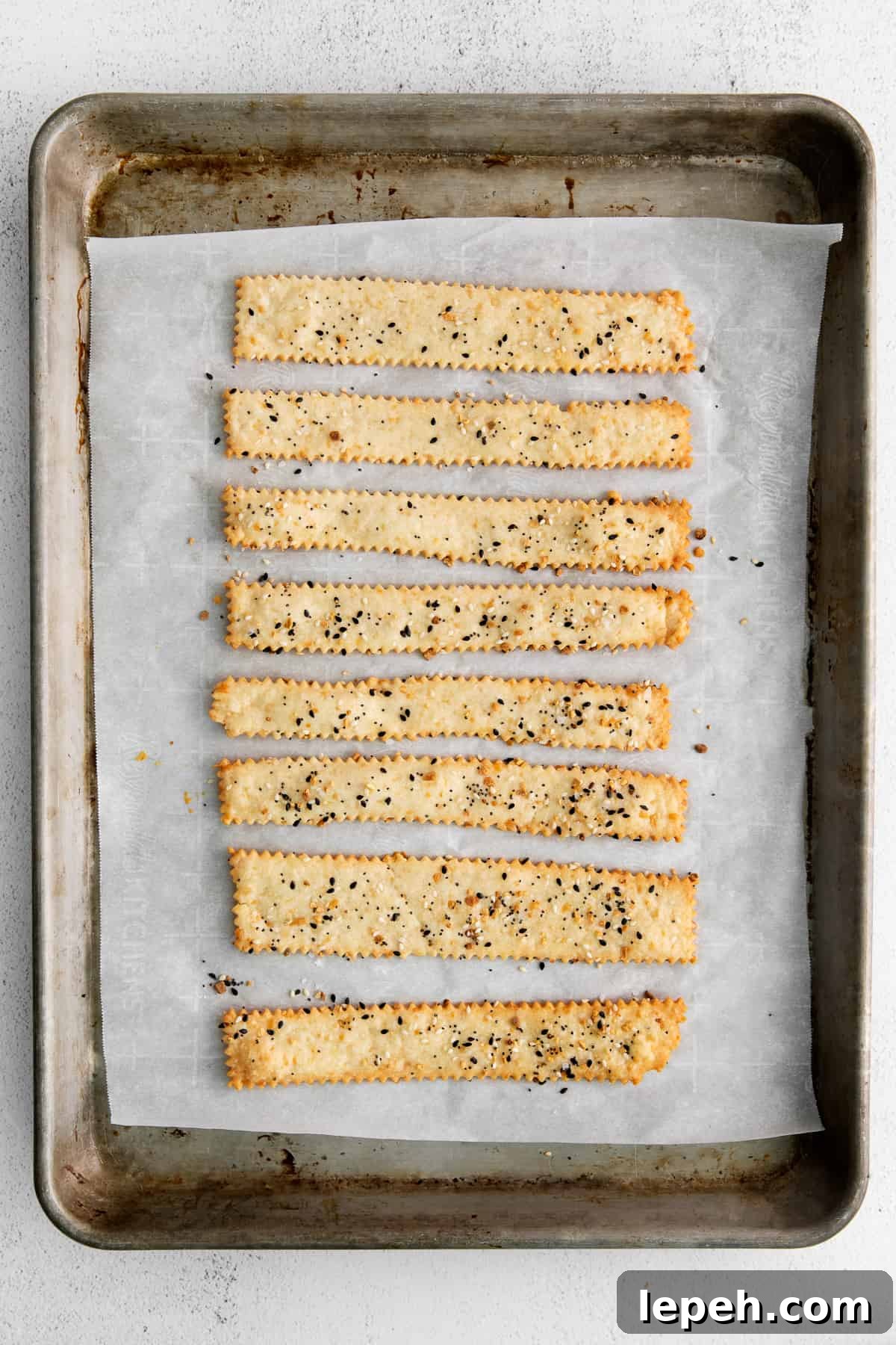 cheese crackers on baking sheet.