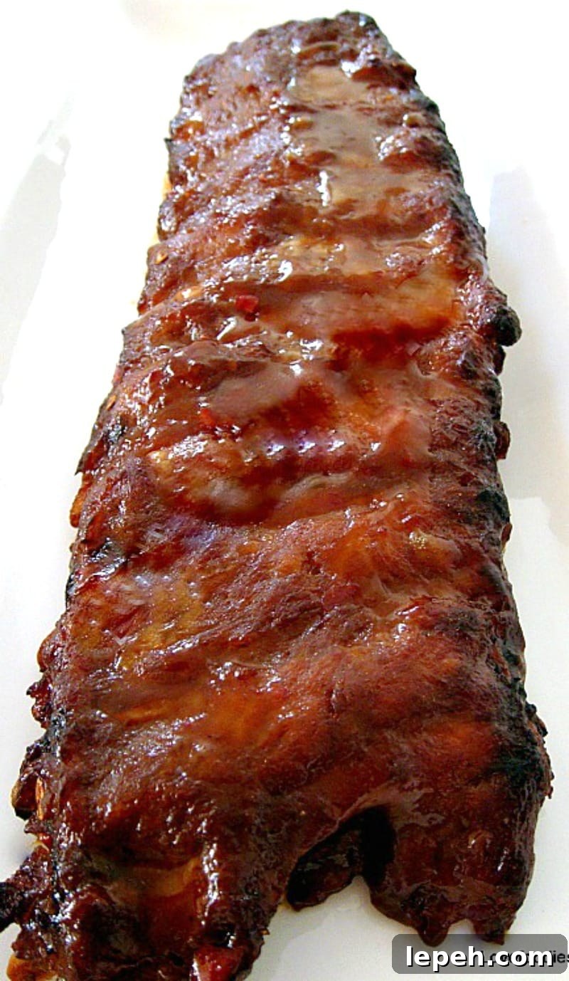 Sweet Chili Sticky Ribs with a fantastic marinade recipe, options for a quick cook and fall of the bone cook. Juicy tender spare ribs everytime! Oven or BBQ ribs recipe
