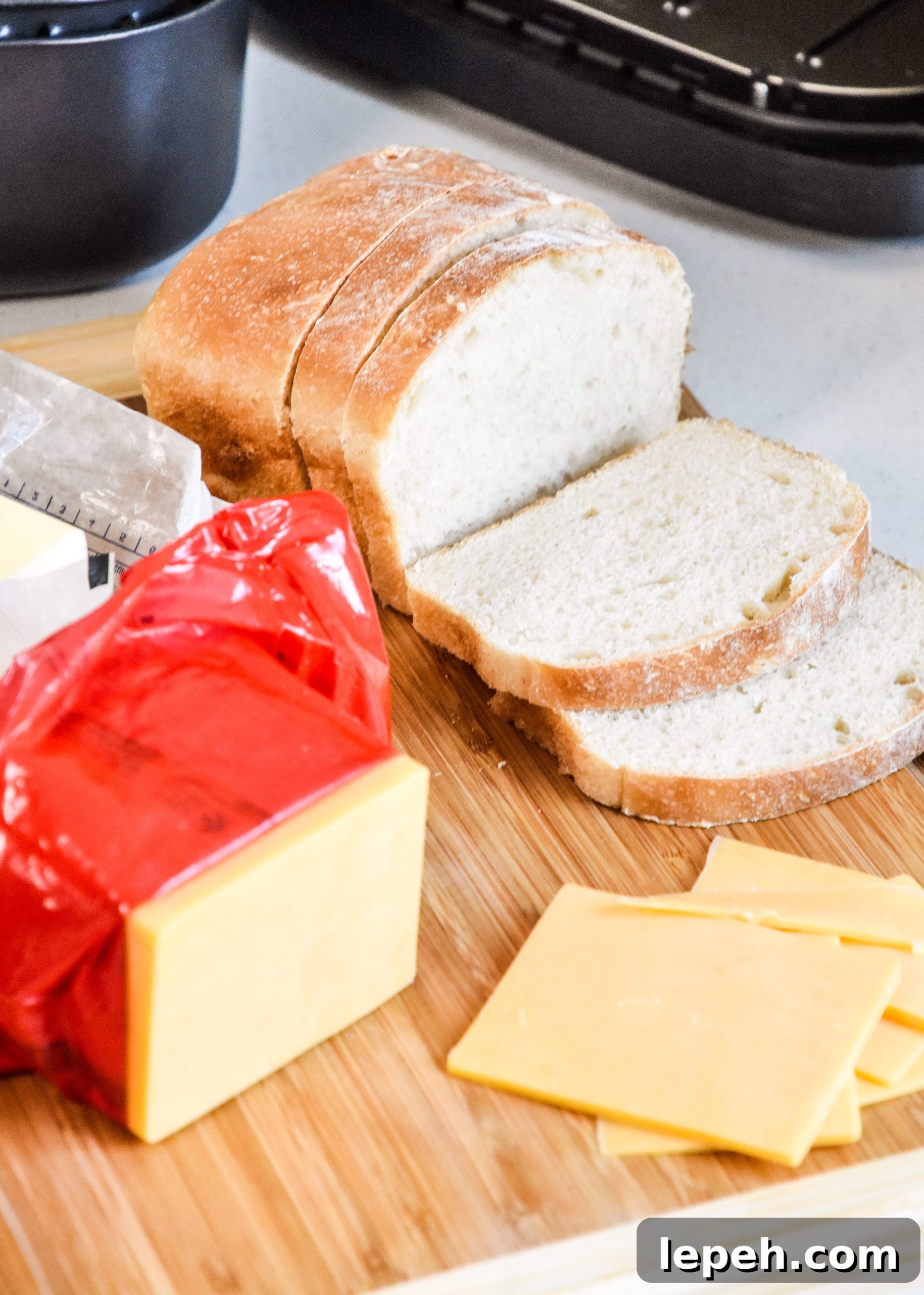 ingredients on a cutting board to make an air fryer grilled cheese sandwich