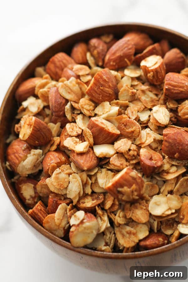 air fryer granola in a wooden bowl.