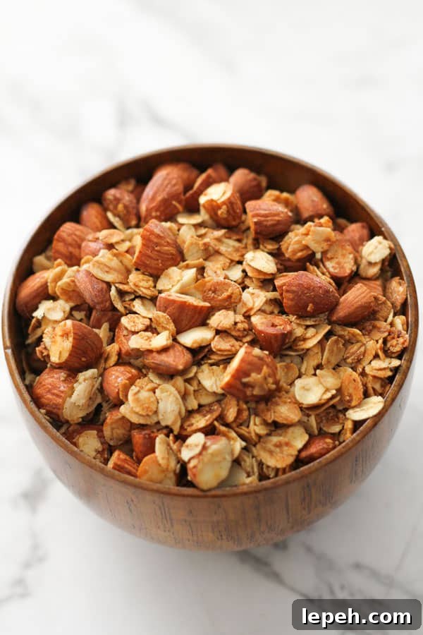 air fryer granola in a wooden bowl.