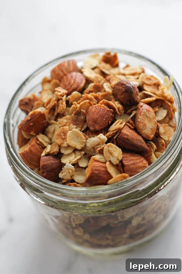 air fryer granola in a glass jar.