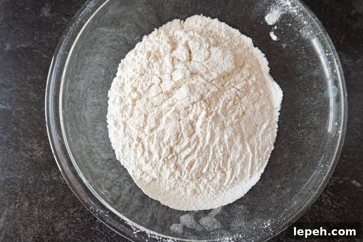 flour baking soda and salt combined in glass bowl.