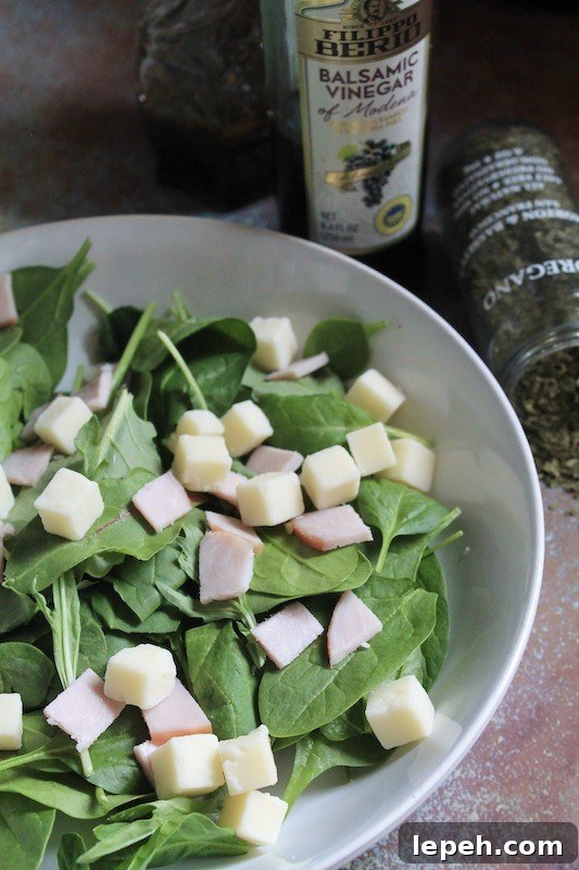 provolone cheese and smoky Canadian bacon green salad