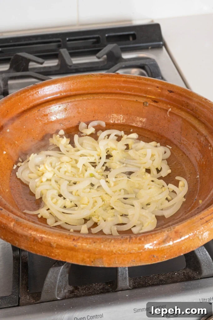 onions and garlic in a tagine