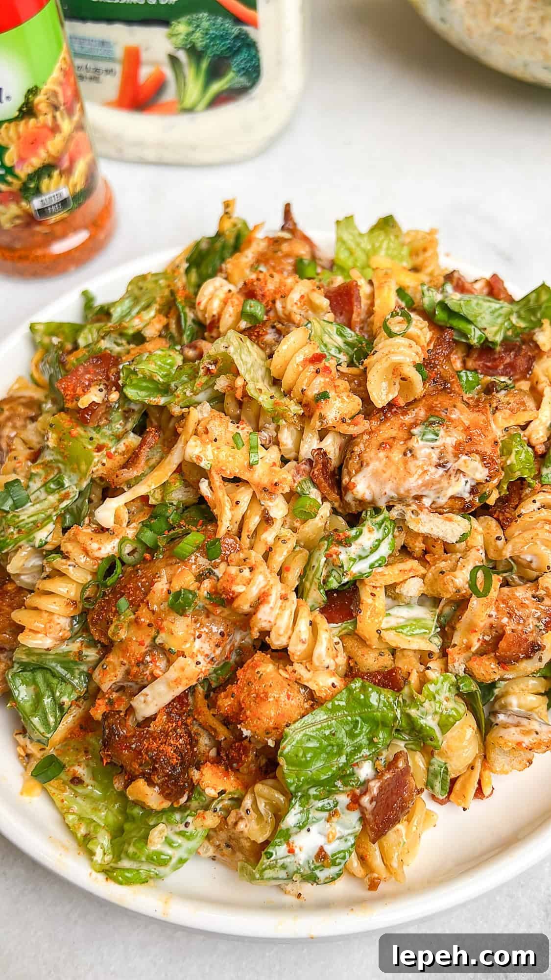 Close up of a plate of chicken bacon ranch pasta salad