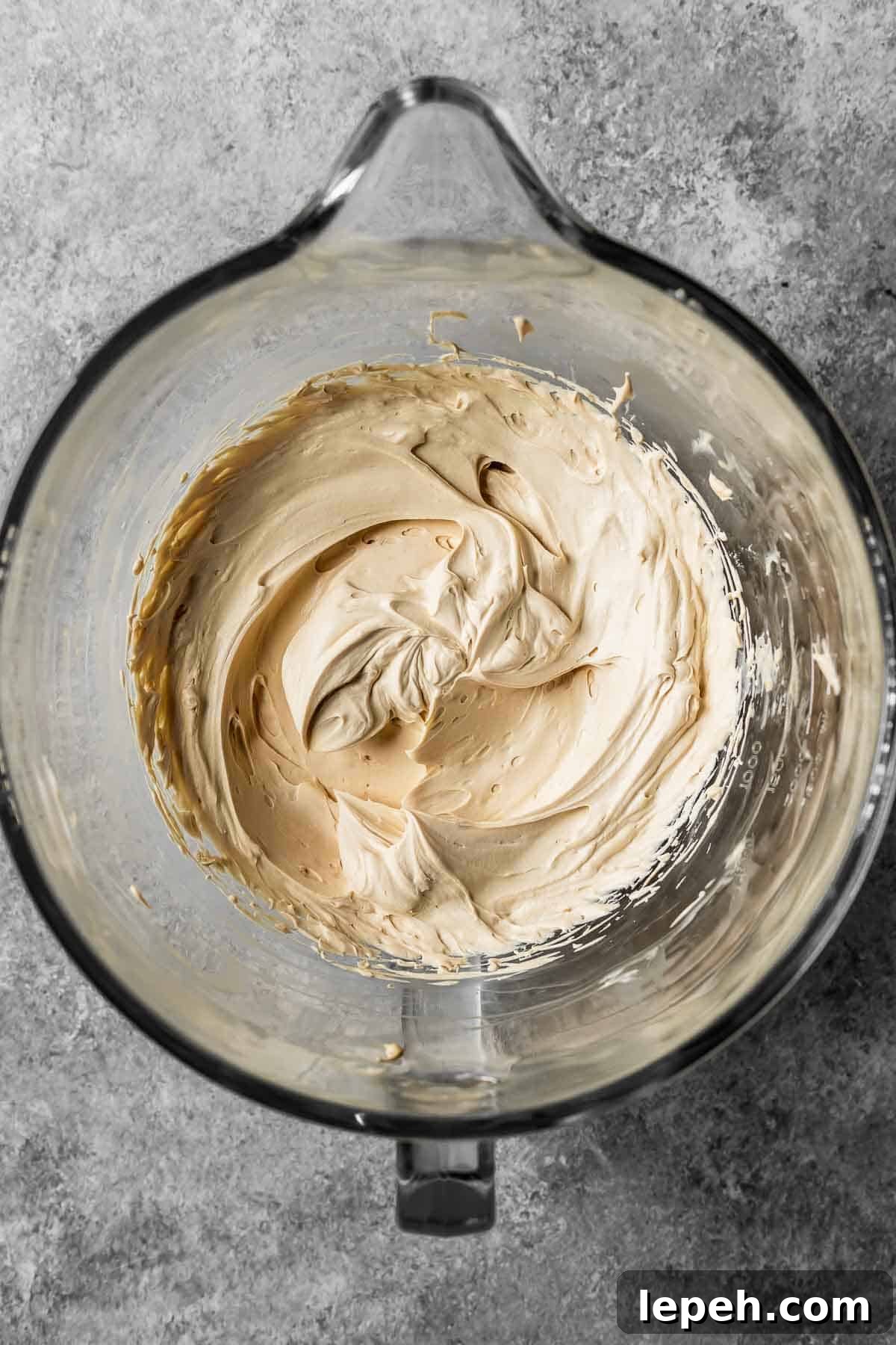 Mascarpone cheese, cream and espresso powder whipped until firm.