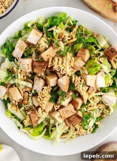 Large bowl of Chinese Chicken Salad with Ramen Noodles.