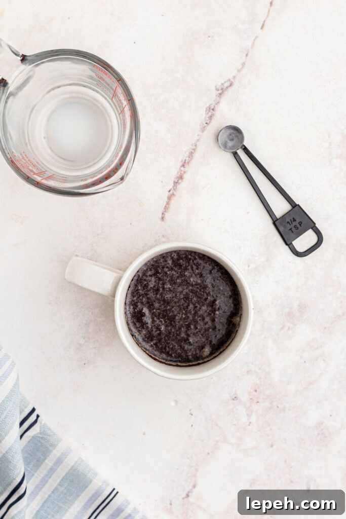 Oreos, baking powder, and milk dissolved in a coffee mug. 