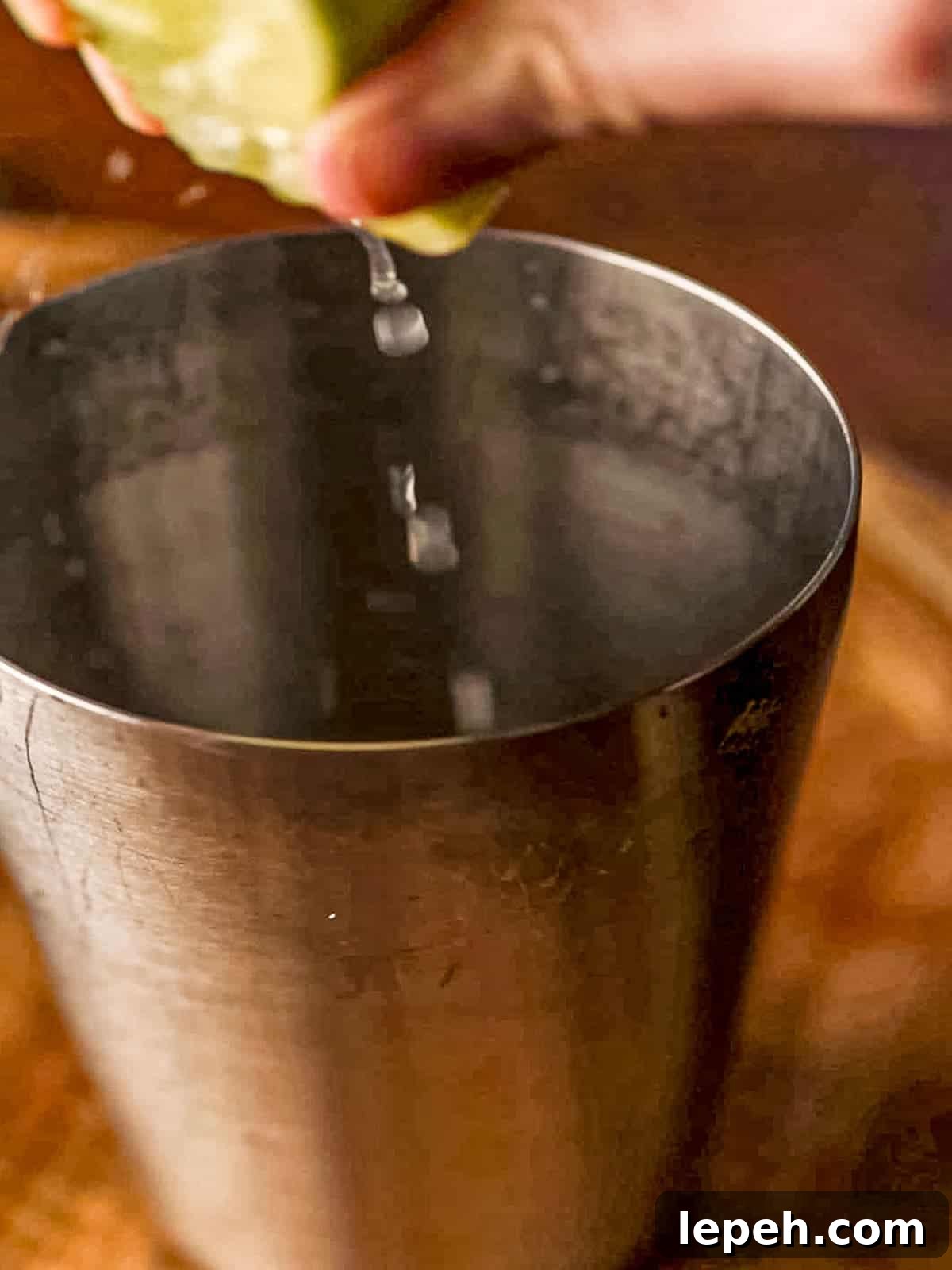Lime being squeezed.