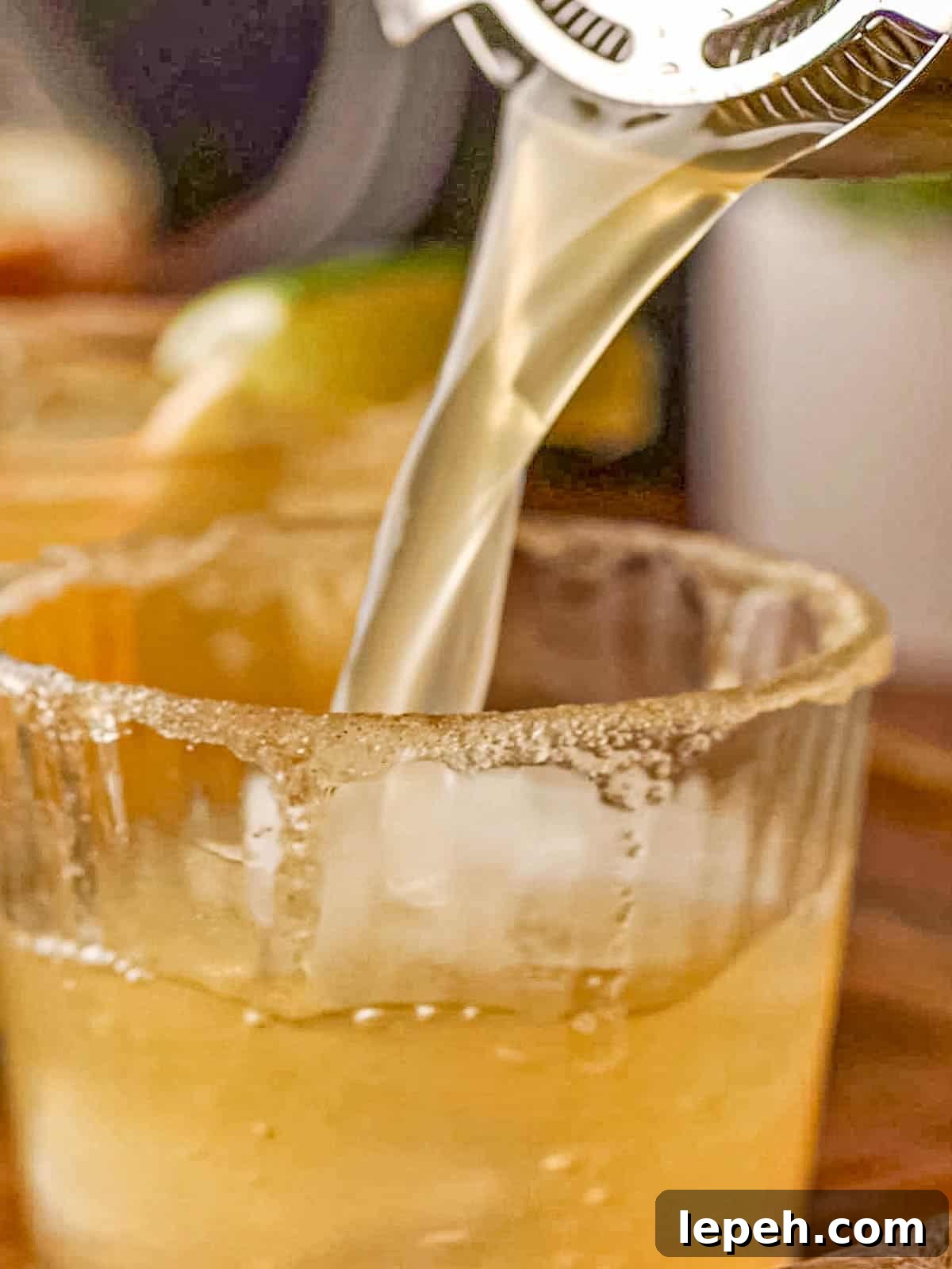 A drink poured into a cocktail glass.
