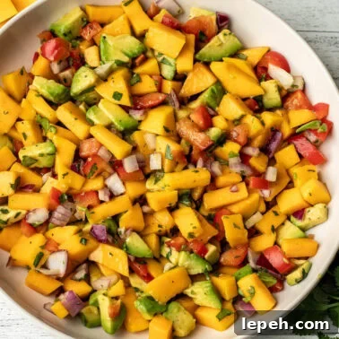 A square image of mango avocado salsa.