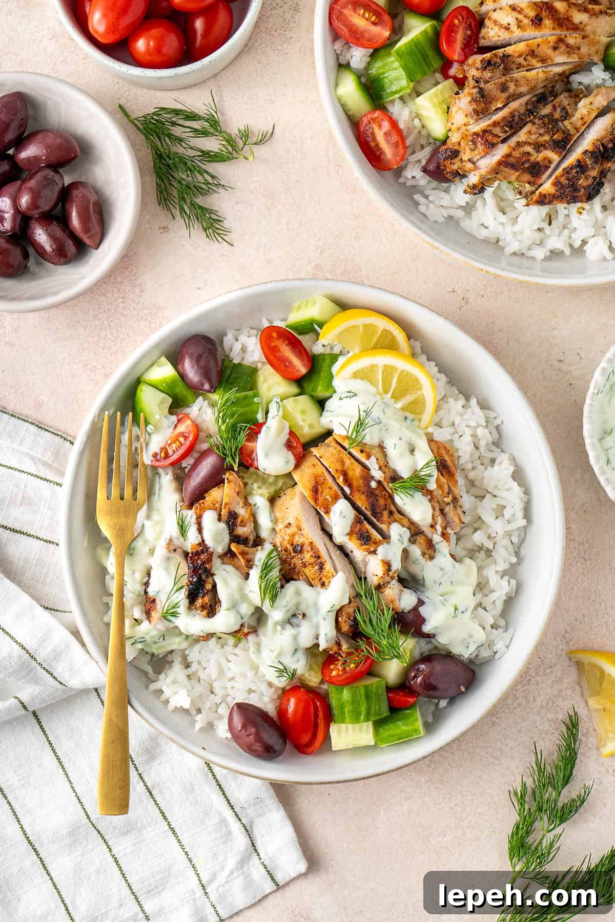 Greek chicken and rice bowls with dairy free tzatziki. 