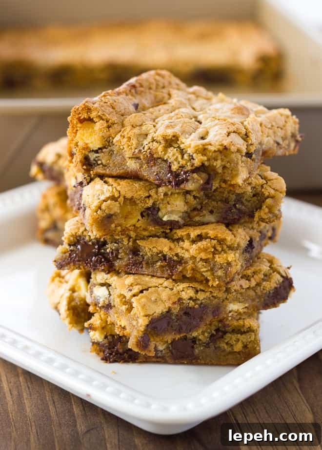 stack of gluten free blondies on white plate