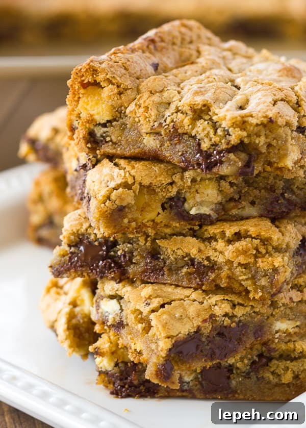 close up shot of gluten free blondies on white plate