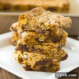 close up shot of almond flour blondies on white plate