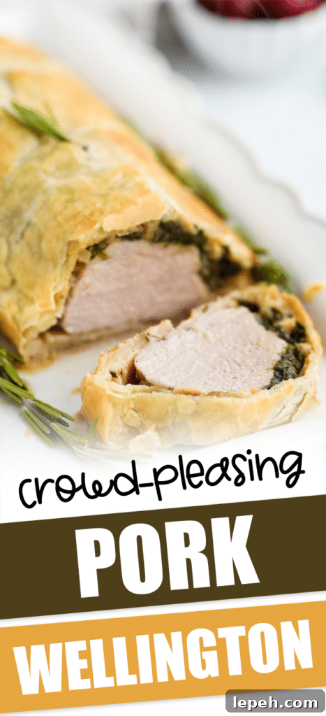 pork wellington on a plate with text that reads crowd-pleasing pork wellington