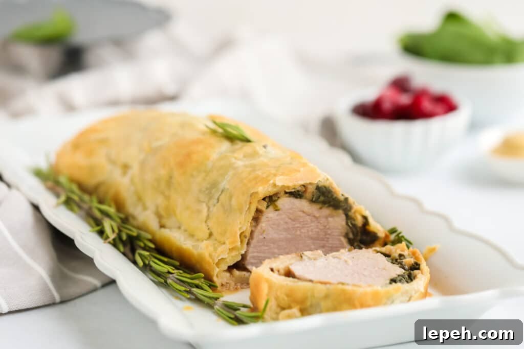 Pork wellington on a plate.