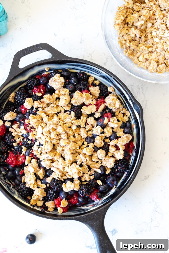 Topping Mixed Berry filling with Oat Almond Crisp topping