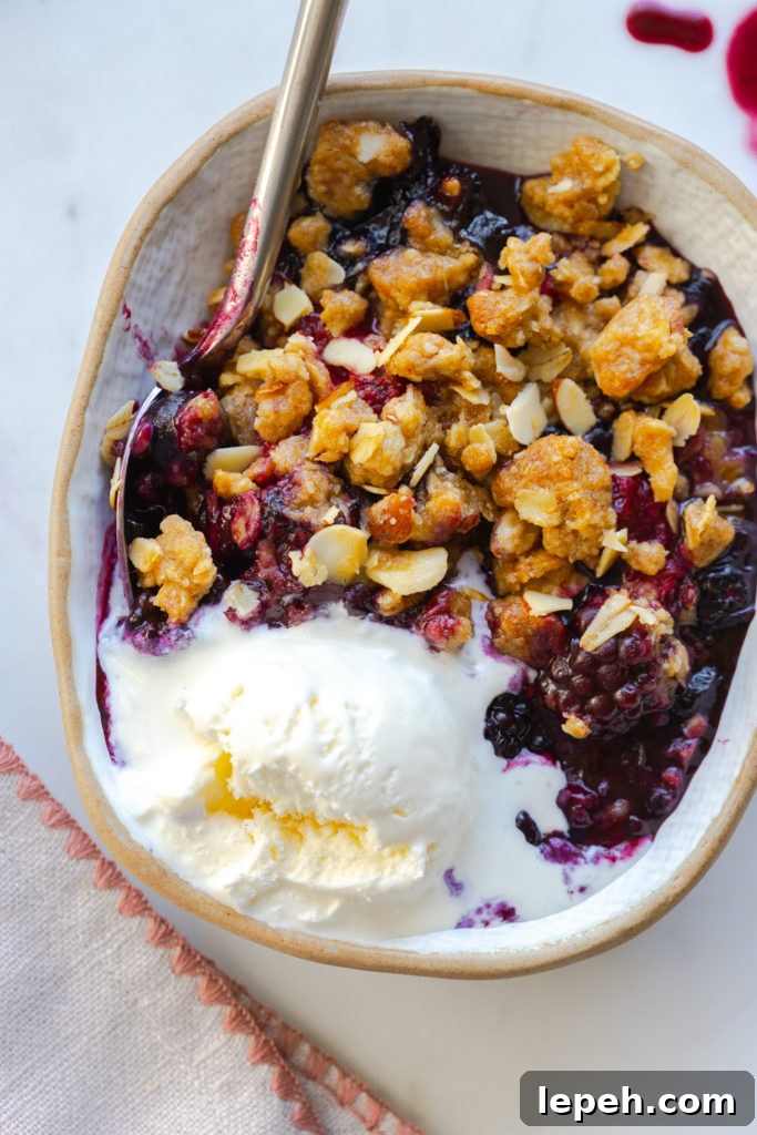 Mixed Berry Oat Almond Crisp with vanilla ice cream