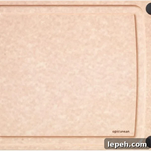 A rectangular, light brown cutting board
