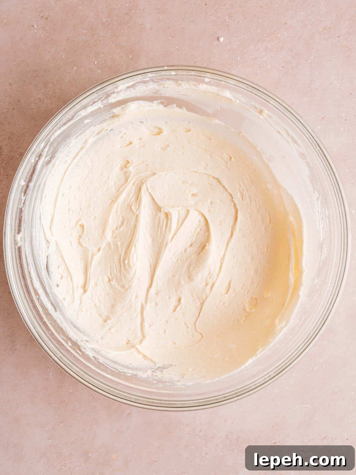 Vanilla buttercream frosting in a bowl.