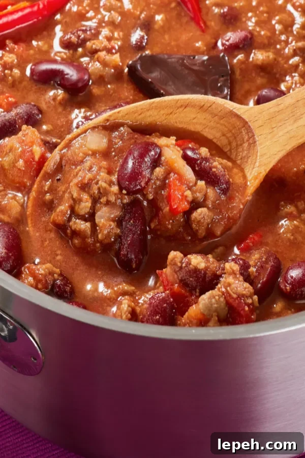 cooking chili in a pot 