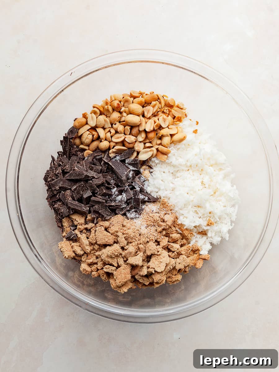 dry ingredients needed for gluten free magic cookies in a large mixing bowl