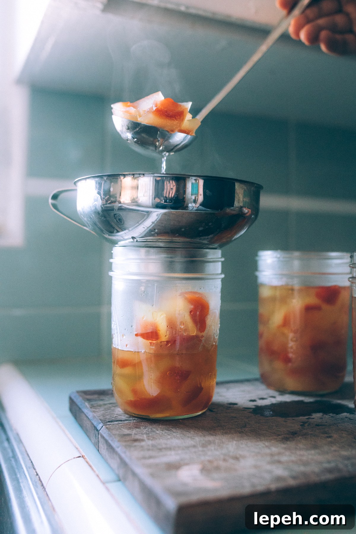 Filling Jars with Watermelon Rind Pickles