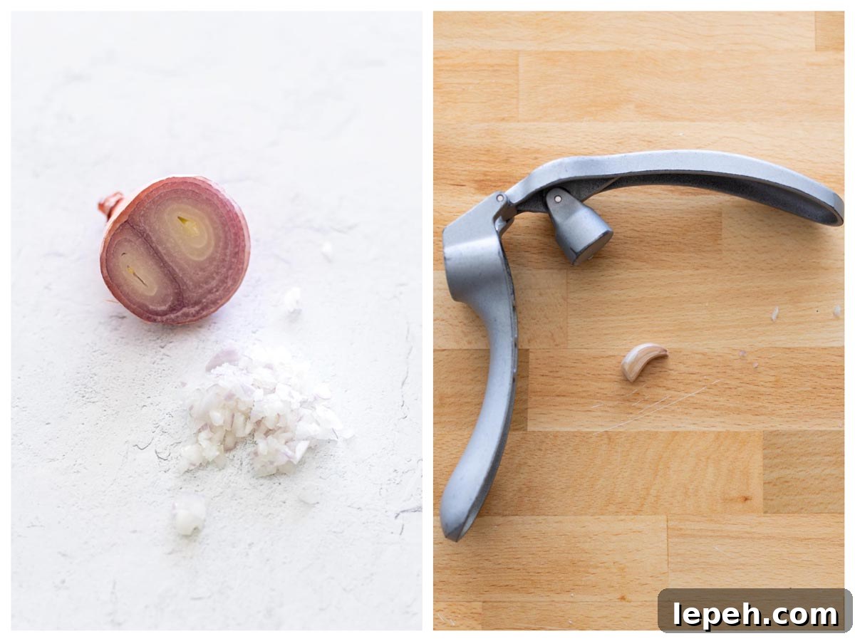 Chopped shallot and minced garlic on a counter.