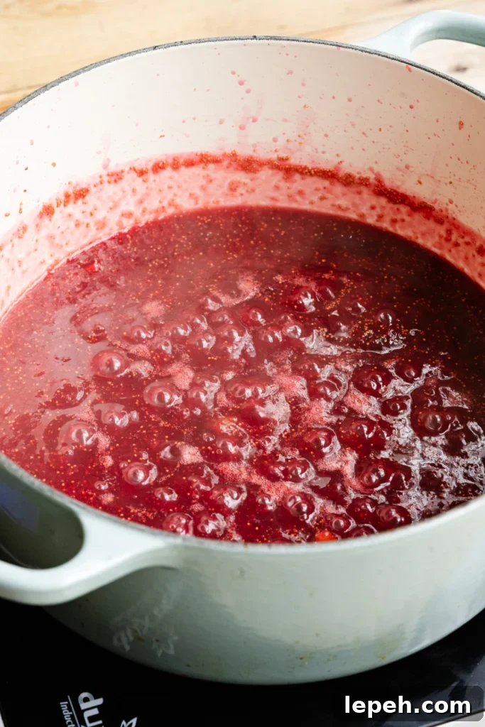 Large pot of boiling fig jam.